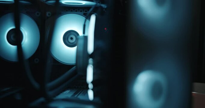 Gaming computer being powered on and fans spinning