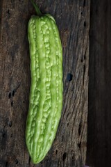 Chinese bitter melon on wood background