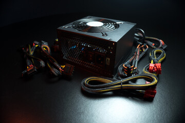 new powerful computer power supply and a set of reinforced wires with connectors