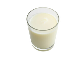 Fresh glass of milk on a clean surface with soft lighting and minimal background