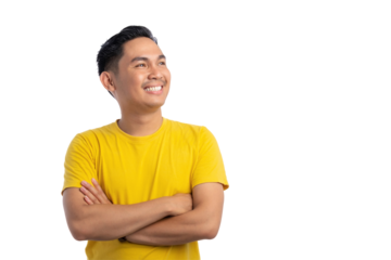 Handsome young Asian man standing with crossed arms, looking aside with a confident smile isolated on transparent background