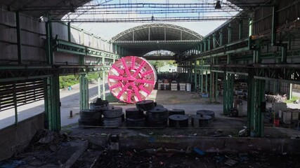 Giant boring machine for making tunnels in old company. Underground tunnels drill.