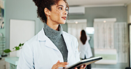 Tablet, thinking and optometrist in store for vision, eye care or wellness report online. Idea, research and female optician with digital technology for checking ophthalmology appointment in shop.