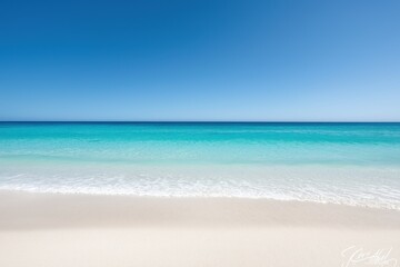 Tranquil beach with clear blue water and white sand under a bright sky