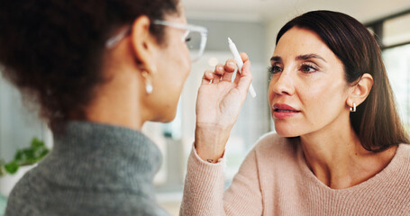 Glasses, eye exam and checkup with women at optometrist for myopia, vision and help. Healthcare, ophthalmologist and optical frame with people in clinic for patient care, consulting and medical lens