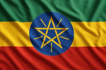 A close-up shows the flag of Ethiopia, with its distinct green, yellow, and red stripes and a blue circle with a yellow star in the center. Concept of: National Identity.