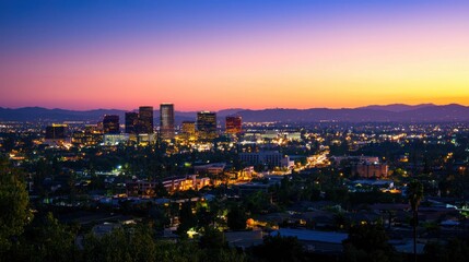 Fototapeta premium A city skyline during the golden hour with soft lighting on the buildings.
