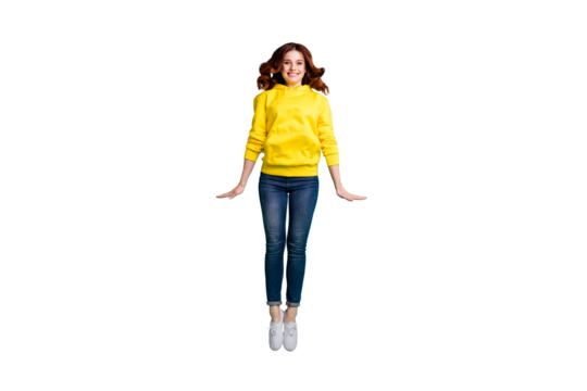 Full length body size photo of cheerful nice cute sweet pretty girlfriend stretching up jumping in jeans denim footwear isolated over vivid turquoise color background - Powered by Adobe