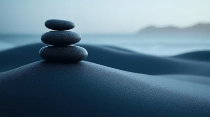 Selbstklebende Fototapeten Three smooth zen stones balanced on blue sand by blurred ocean © M.Gierczyk