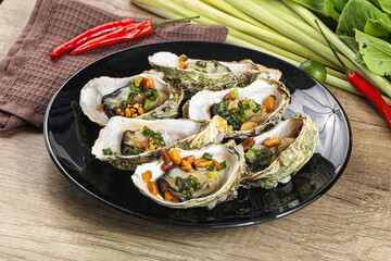 Baked oysters with green onion