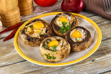 Baked champignon with quail egg