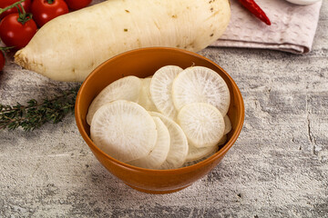 Sliced white daikon radish in the bowl