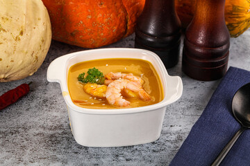 Pumpkin cream soup with prawns