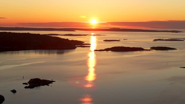 Str&ouml;mstad Stromstad Sweden aerial drone Scandinavia Arctic Circle islands golden sunset sun rays on horizon peaceful calm still Sandelfjord Fjord Skagerrak Baltic Sea marina harbor picturesque static