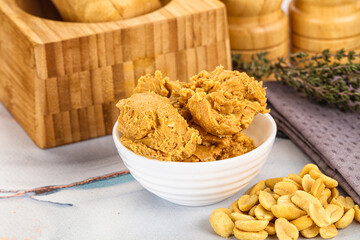 Crunchy peanut butter fat product
