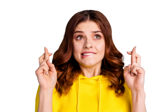 Photo of stylish trendy wavy curly scared fearful girl anticipating in bad mood wearing yellow sweater sweatshirt biting her lips isolated over turquoise vivid color background