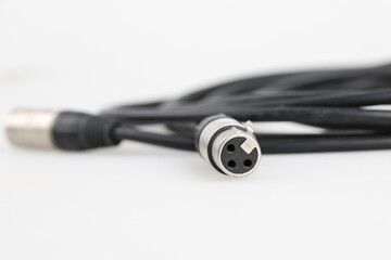 Audio cable connection demonstration technology workshop instructional video indoor setting close-up shot sound quality basics