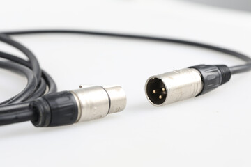 Audio equipment connection xlr cable studio environment product image professional setup close-up...