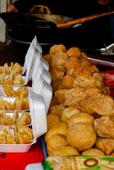 cooking fried meatballs directly in a hot frying pan, Fried meatballs are street food