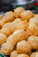 cooking fried meatballs directly in a hot frying pan, Fried meatballs are street food