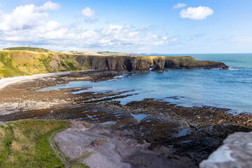 Dunnottar Castle rises in dramatic ruins atop a cliff overlooking the North Sea. Its breathtaking views, rich history, and rugged beauty make it one of Scotland’s most iconic and cinematic locations.