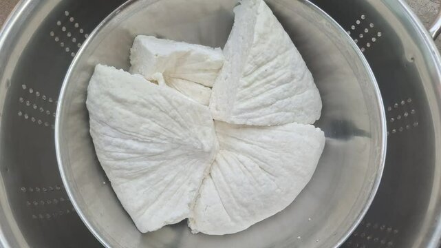 Paneer is a soft, fresh, and versatile Indian cheese made from milk, often used in curries and snacks.