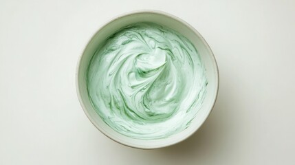 Top view of a bowl with natural green sour cream