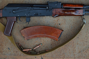AKM. machine gun with cartridges	