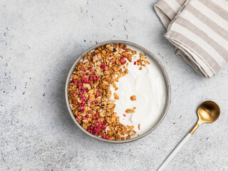 yogurt with granola and raspberries, breakfast