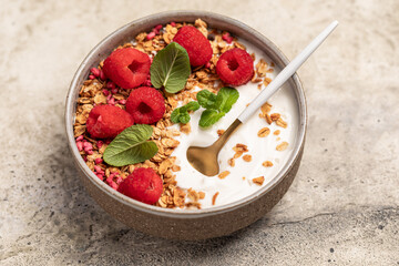 yogurt with granola and raspberries, breakfast