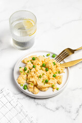 Plate of tasty scrambled eggs, breakfast