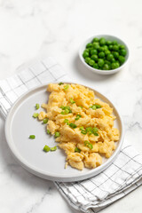 Plate of tasty scrambled eggs, breakfast