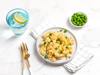 Plate of tasty scrambled eggs, breakfast