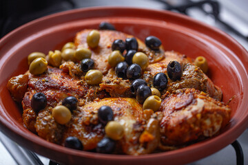Chicken cooked with olives.