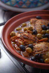 Chicken cooked with olives.