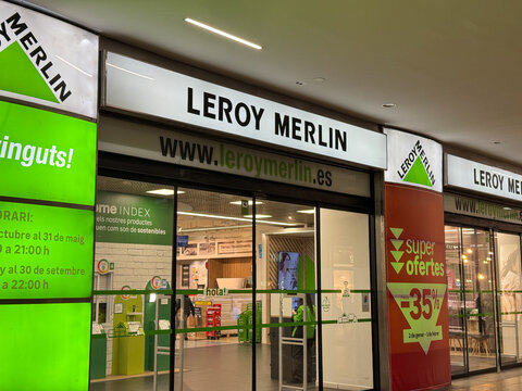 Barcelona, Spain, 4 april 2025: Leroy merlin storefront showing sale sign and opening hours in a shopping mall