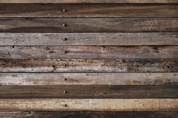 Empty dark brown plank old wooden board background. Beautiful texture and pattern panels from...