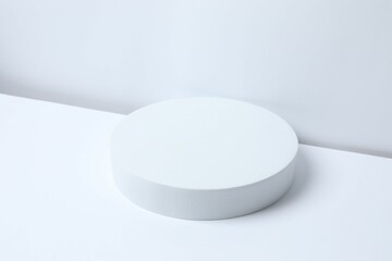 White podium on a light background