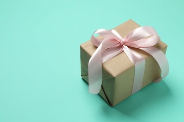 Beautiful gift box on color background