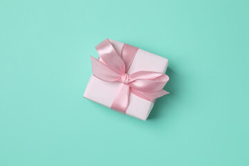 Beautiful gift box on color background