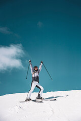 Photo of happy woman on ski in Italy