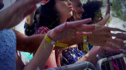 Outdoor concert with people connected through digital network animation overlay - Powered by Adobe