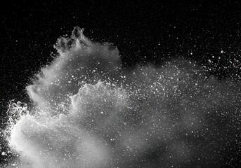 A dramatic monochrome image showcasing a cloud of white powder suspended against a dark background