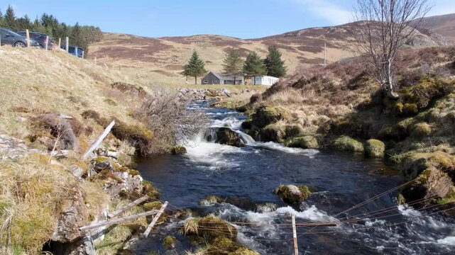 Scenic Scottish landscape view of river at Bone Caves of Inchnadamph in Sutherlands, highlands Scotland UK