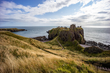 Dunnottar Castle rises in dramatic ruins atop a cliff overlooking the North Sea. Its breathtaking...