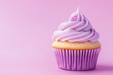 A Delicious Cupcake Adorned With Swirls of Pink Frosting