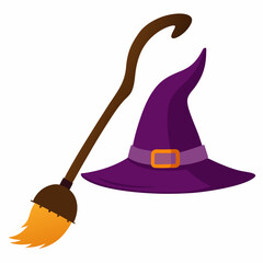 A witch’s hat and broomstick laying on the ground 