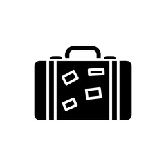 Black Icon of Suitcase with Stickers and Handle in Filled Style