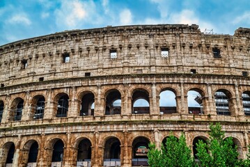 Iconic Colosseum in Rome with Vibrant Sky