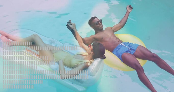 Couple relaxing on pool floats with abstract data animation overlay